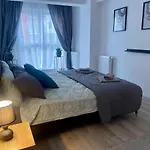 Divany Apartaments - Coresi Mall